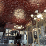 Ornate pressed-tin ceiling in a historic London pub