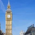 Big Ben and the Houses of Parliament under a blue sky