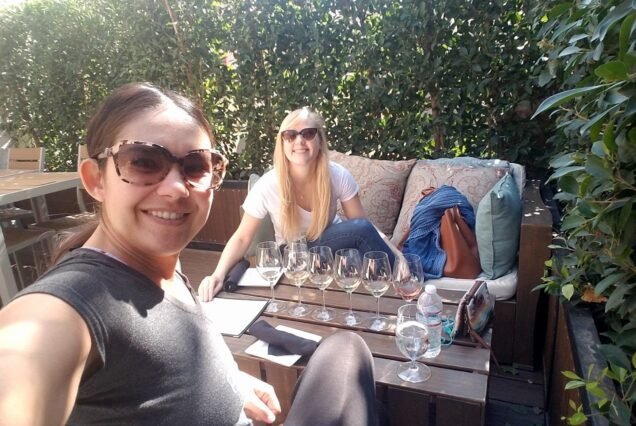 Wine flight tasting on a garden terrace