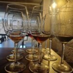 Wine flight glasses lined up for a tasting