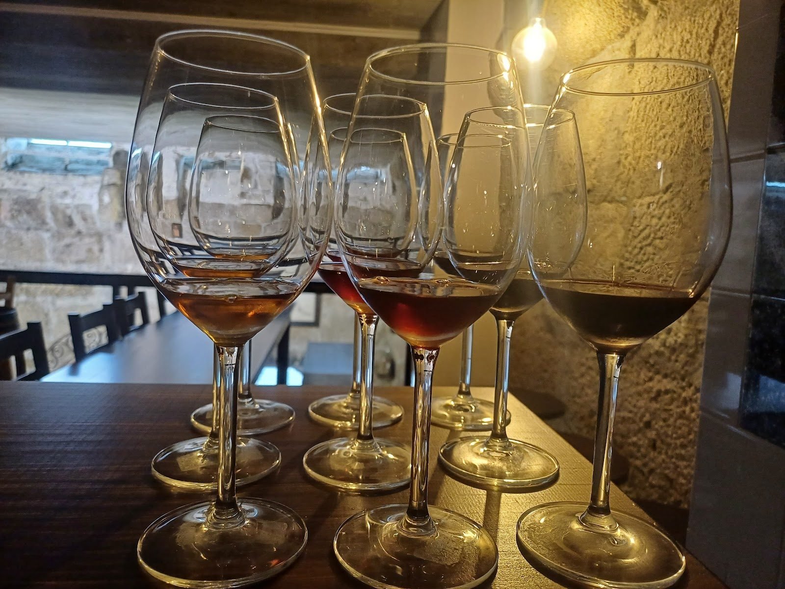 Wine flight glasses lined up for a tasting